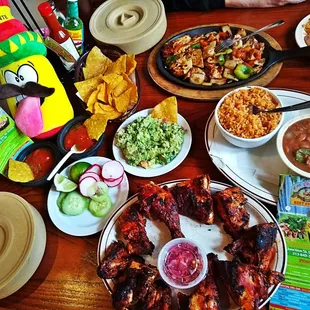 a table full of mexican food