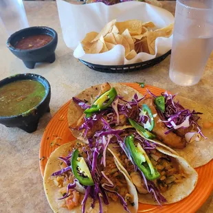 Shrimp and fish tacos with salsa.