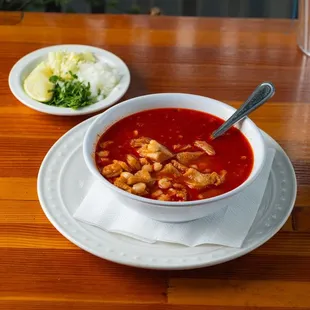 a bowl of soup on a plate