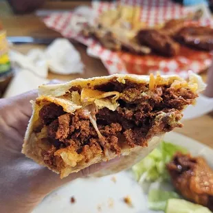 Breakfast Burrito chorizo. Chicken wings were  also.