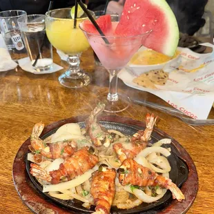 Bacon wrapped shrimp and watermelon margarita