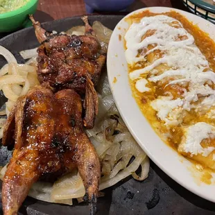 Two small quail, and a wonderful cheese enchilada, my favorite plate.