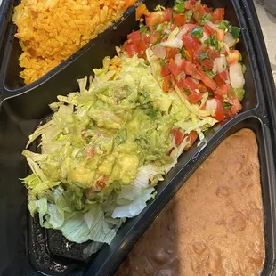 Toppings and sides that were provided for the fajita nachos. We each got one of these and my hubby also got a topping container.