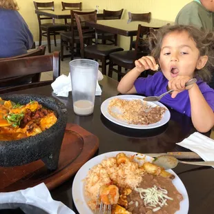 a little girl eating