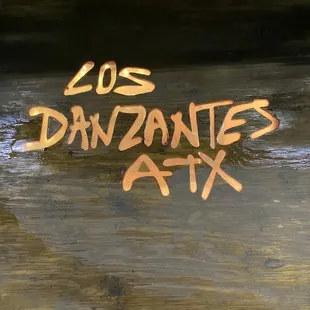 Translates to "The Dancers"