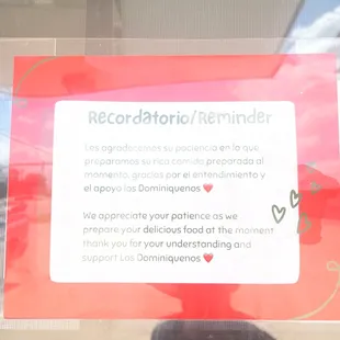 a sign in the window of a restaurant