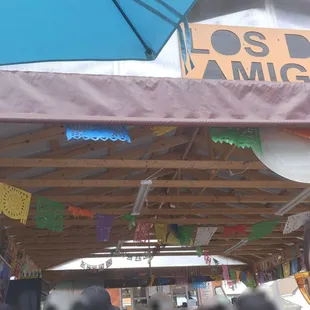 They built this HUGE pavilion next to the truck. Total upgrade.