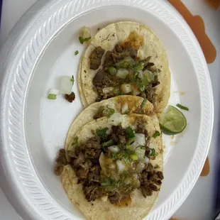Two asada tacos. Ty person who answered the phone and called the staff at the truck to let them know I was coming!