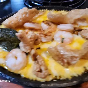 Queso fundido is nasty.. cheese is very greasy It doesn't come with tortillas