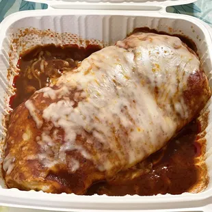 Burrito Enchilado (1/2 beef 1/2 pork), the red sauce has a strong taste, I like the green sauce better.
