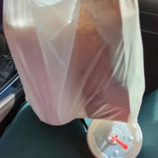 Salsa (24oz on the left) and chips (right) to go The 24oz soda on the bottom right