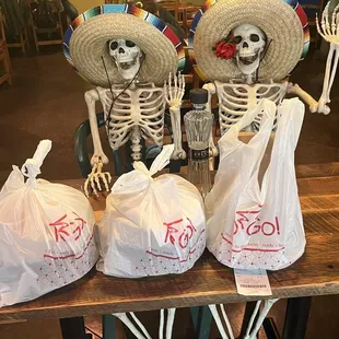 skeletons in sombren hats and sombrens