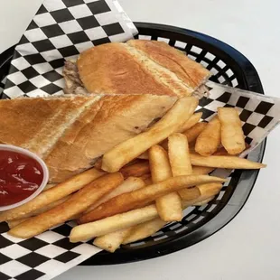 a basket of fries and a sandwich