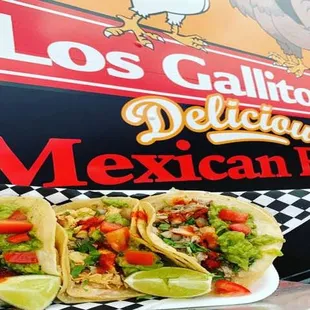 two tacos in front of a truck