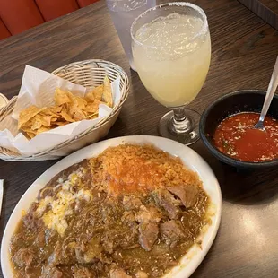 Chili Verde with rice and beans. Chips and salsa. Margarita on the rocks.