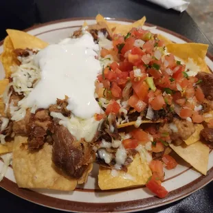 Delicious Carnitas nachos.... verryyyy good,and full of flavor