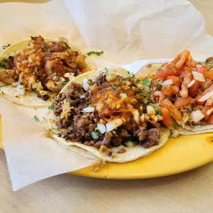 Beef, pork and chicken tacos