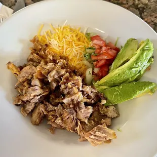 Healthy option: Carnitas Burrito Bowl (hold the rice and beans).