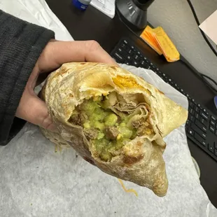 $15 carne asada burrito add cheese.