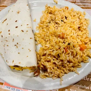a burrito and rice on a plate