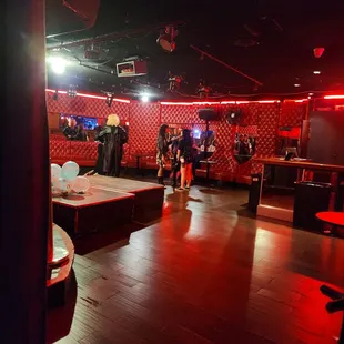 a bar with red lights