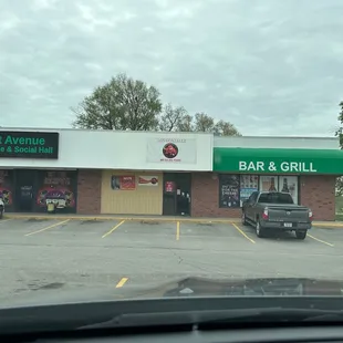 a bar and grill in a parking lot