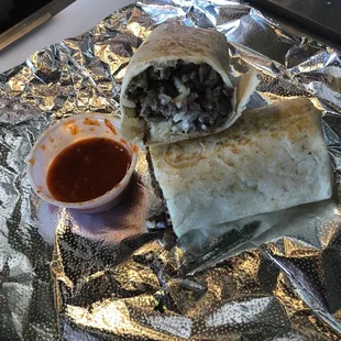 Burritos $6.50 Meat (Steak,Seasoned Pork,Shredded Beef,Chicken and Beef Tongue)Onion &amp; cilandro mix,cheese sour cream,rice and beans.