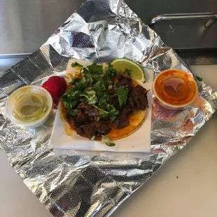 Traditional Birria (shredded beef) Taco $2.50