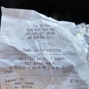 a person holding a receipt