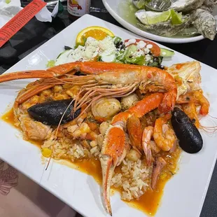 a plate of seafood and rice