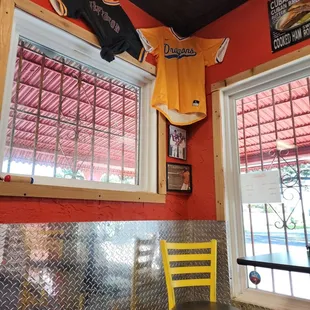 a yellow chair in a restaurant