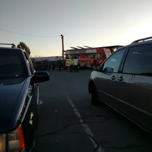 wo cars parked in a parking lot