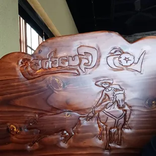 Beautiful carving in each booth.