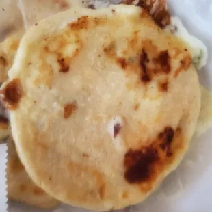 Cheese and loroco pupusa