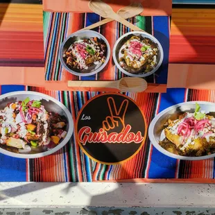 three bowls of mexican food