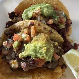 Handmade tortilla, asada and chorizo tacos