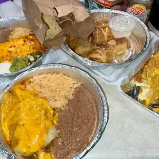 Burrito, Apple Flauntas, Ground Beef Enchiladas, Hard Shell Tacos, Rice &amp; Beans
