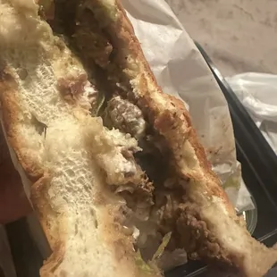 Just bread.. barely any meat or beans.. tossed in the trash.