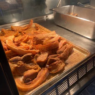 a tray of fried meat