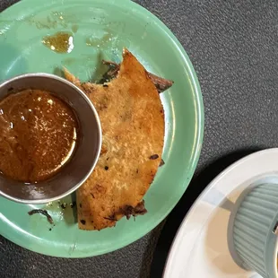 Burria taco with dipping sauce