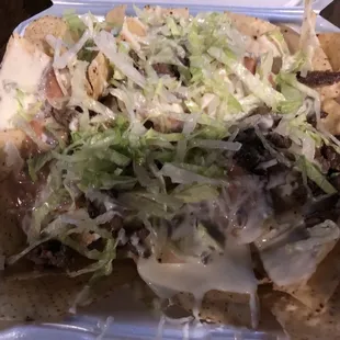 Steak nachos with bean instead of pico