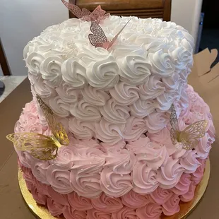 a pink and white cake