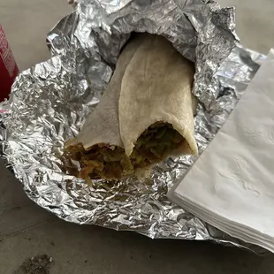 chicken super burrito, no sour cream, no sauce, refried beans, mild salsa.