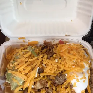 Mini super nachos with carnitas (and more cheese on top cause I&apos;m into it)