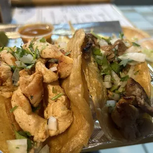 Chicken and steak Mexican street tacos.