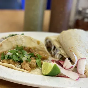 Tacos de chicharrón with a quesadilla.
