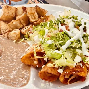 Chicken Enchiladas, Beans, and Potatoes