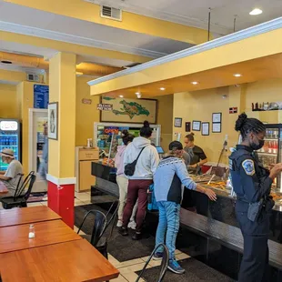 a group of people in a restaurant