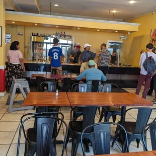 a group of people in a restaurant