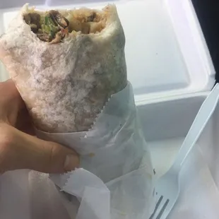 Carne Asada Burrito with green &amp; red salsa, cheese, and cilantro. Yum! And Huge!